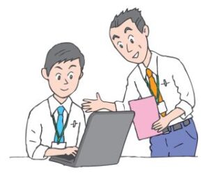 引き継ぐ先輩社員と引き継がれる後輩社員